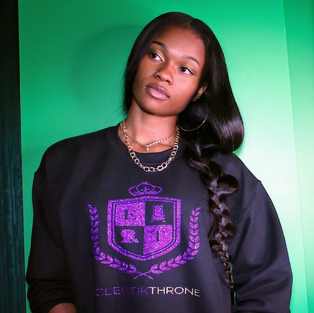 Black sweatshirt with sparkle logo